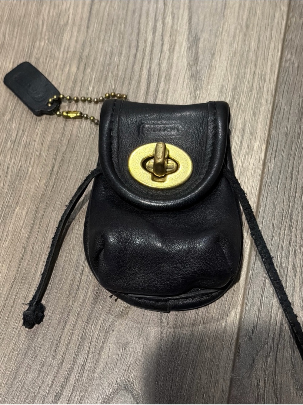 Coach Black Leather Mini Pouch with Gold Turnlock Charm